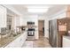 Modern kitchen with stainless steel appliances and granite countertops at 2070 Keyes Ln, Deltona, FL 32738