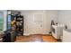 Functional laundry room with appliances, storage shelves, and easy access to the exterior at 2070 Keyes Ln, Deltona, FL 32738
