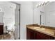Bathroom featuring a vanity with an adjoining bathroom at 2081 The Oaks Blvd, Kissimmee, FL 34746