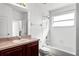 Bright bathroom with tub and vanity at 2081 The Oaks Blvd, Kissimmee, FL 34746