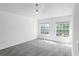 Sunlit bedroom featuring two large windows at 2081 The Oaks Blvd, Kissimmee, FL 34746