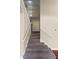 Carpeted staircase leading to the second floor, featuring white railings and neutral-toned walls at 2081 The Oaks Blvd, Kissimmee, FL 34746