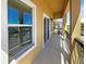 Spacious balcony with wrought iron railing, providing an excellent outdoor living space at 2124 Betsy Ross Ln, St Cloud, FL 34769