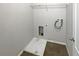 Utility room with washer and dryer hookups and storage space at 2124 Betsy Ross Ln, St Cloud, FL 34769