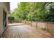 Spacious wooden back deck perfect for outdoor entertaining and relaxation at 2132 Majestic Woods Blvd, Apopka, FL 32712