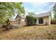 Well-maintained backyard with a wooden deck, perfect for outdoor gatherings at 2132 Majestic Woods Blvd, Apopka, FL 32712