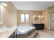 Bright bathroom with soaking tub, double vanities, a walk-in shower, and natural light at 2132 Majestic Woods Blvd, Apopka, FL 32712