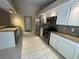Bright kitchen with stainless steel appliances and granite countertops at 2132 Majestic Woods Blvd, Apopka, FL 32712