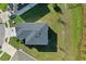 Aerial view of the home showing roof and lot at 216 Miles Ct, Davenport, FL 33837