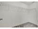 Spacious walk-in closet with a metal wire shelving system for optimal storage and organization at 216 Miles Ct, Davenport, FL 33837