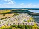 Aerial view of a neighborhood with many homes at 2237 Wood Stork Ln, St Cloud, FL 34771