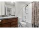 Bathroom features a shower-tub combo, toilet, and vanity at 2237 Wood Stork Ln, St Cloud, FL 34771
