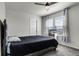 Bedroom with a wooden fan and light coming from windows at 2237 Wood Stork Ln, St Cloud, FL 34771