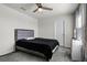 Bedroom with grey carpet and a window with curtains at 2237 Wood Stork Ln, St Cloud, FL 34771