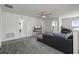 Upstairs living room area featuring carpet and a seating area at 2237 Wood Stork Ln, St Cloud, FL 34771