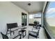 Covered patio with outdoor seating and a grill at 2237 Wood Stork Ln, St Cloud, FL 34771