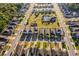 Expansive aerial view showcasing a residential neighborhood with a central community area featuring a pool and playground at 2289 Aloe Aly, Apopka, FL 32703