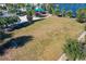 Aerial view of an expansive green field with goal posts at 2412 Tanger Dr, Kissimmee, FL 34747