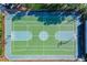 Overhead view of a vibrant basketball court, featuring colorful court markings at 2412 Tanger Dr, Kissimmee, FL 34747