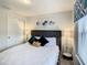 Inviting bedroom with plush bedding, stylish side tables, and ample closet space at 2412 Tanger Dr, Kissimmee, FL 34747