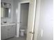 Bathroom featuring new flooring, vanity and toilet at 2593 Grassy Point Dr # 101, Lake Mary, FL 32746
