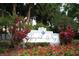 Regency Park at Lake Mary Community sign surrounded by colorful foliage at 2593 Grassy Point Dr # 101, Lake Mary, FL 32746