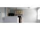 Neutral kitchen featuring ample storage cabinets and black appliances at 2593 Grassy Point Dr # 101, Lake Mary, FL 32746