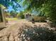 Backyard featuring an above ground pool, lawn, and shed at 312 Verbena Dr, Orlando, FL 32807