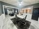 Dining room with modern table set, stylish lighting, and bright open concept at 312 Verbena Dr, Orlando, FL 32807