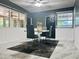 Dining room with modern table set, stylish lighting, and bright open concept at 312 Verbena Dr, Orlando, FL 32807