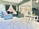 Stylish living room with modern flooring, comfortable seating, and bright, open layout at 312 Verbena Dr, Orlando, FL 32807