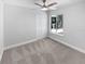 Minimalist bedroom featuring neutral colors, a ceiling fan, and a closet at 341 Kirkcaldy Dr, Winter Springs, FL 32708