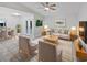 Bright living room features neutral tones, a ceiling fan, and stylish furniture perfect for modern living at 341 Kirkcaldy Dr, Winter Springs, FL 32708