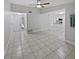 Spacious living room features tile flooring with lots of natural light and an open floor plan at 341 Kirkcaldy Dr, Winter Springs, FL 32708