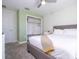 Comfortable bedroom featuring a closet, neutral decor, and plenty of natural light at 428 Ocean Course Ave, Davenport, FL 33896