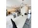 Open concept with modern chandelier, light grey walls, and stylish marble tile floor at 428 Ocean Course Ave, Davenport, FL 33896