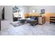 Inviting living room with modern decor, comfortable seating, and a sliding door to a private patio at 428 Ocean Course Ave, Davenport, FL 33896
