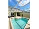 A private outdoor pool with covered patio at 428 Ocean Course Ave, Davenport, FL 33896