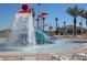 Fun waterpark area with colorful water slides and lounge chairs for relaxing at 428 Ocean Course Ave, Davenport, FL 33896