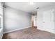 Bedroom featuring neutral walls, plush carpet flooring, and a bright, airy ambiance at 5144 Ravena E Ave, St Cloud, FL 34771