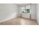 Bright bedroom with tile flooring, large window, and neutral walls at 5144 Ravena E Ave, St Cloud, FL 34771