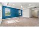 Large main bedroom offers carpeting, natural light, a tray ceiling, and an ensuite bathroom at 5144 Ravena E Ave, St Cloud, FL 34771