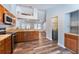 Modern kitchen featuring stainless appliances, and seamless transition to the living area at 515 Columbus Ave, Orange City, FL 32763