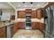 Modern kitchen with stainless steel appliances, granite countertops, and custom cabinetry at 519 N Clara Ave, Deland, FL 32720