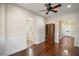 Beautiful living room with modern wainscoting and hardwood flooring at 519 N Clara Ave, Deland, FL 32720