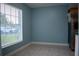 Corner of the kitchen with a window, tile floors, and view of the outside at 5220 Curry Ford Rd # 303, Orlando, FL 32812