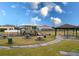 Community playground with slides, picnic tables, and a covered pavilion offers residents recreation space at 5502 Willow Bend Trl, Kissimmee, FL 34758