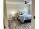 Bright bedroom with stylish flooring, modern furniture and a light, airy feel at 6104 Topher Trl # 6104, Mulberry, FL 33860