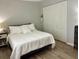 Bedroom featuring neutral walls, closet, stylish flooring and ample natural light at 6104 Topher Trl # 6104, Mulberry, FL 33860