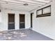 Spacious carport area featuring painted brick and covered parking at 6312 Appian Way, Orlando, FL 32807